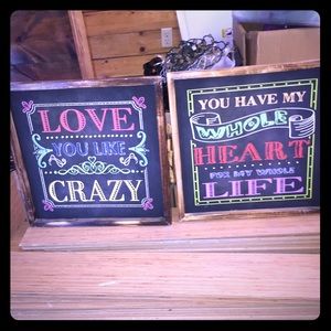Two framed pieces of chalk board art